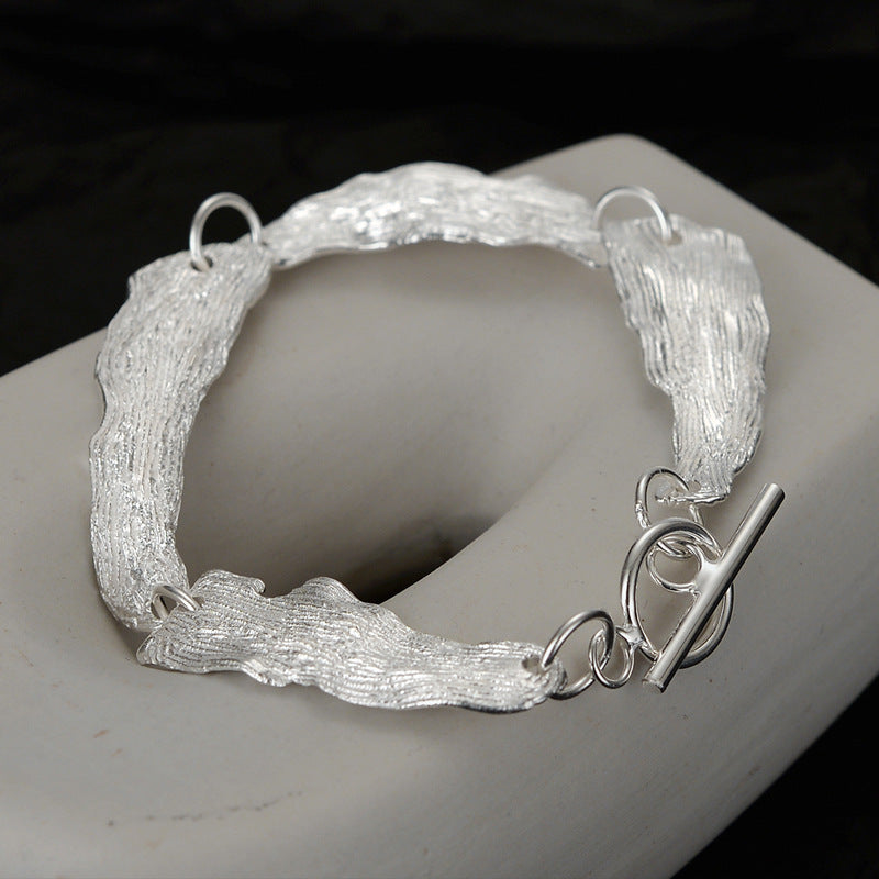 Gliederarmband mit faltigem Blattmuster B1039