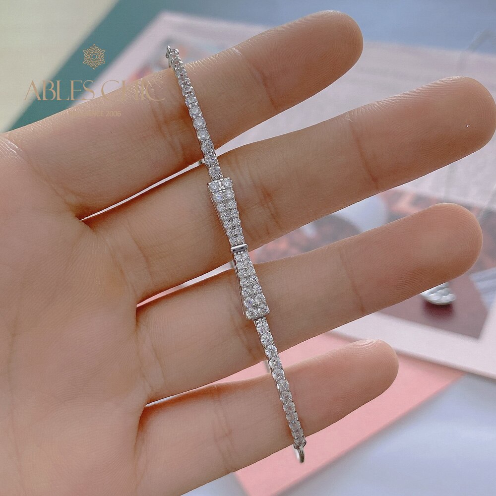 Armband mit gepflasterter Fliege und Bling-Bling-Anhänger B0823