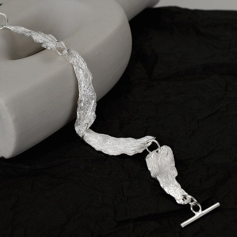 Gliederarmband mit faltigem Blattmuster B1039