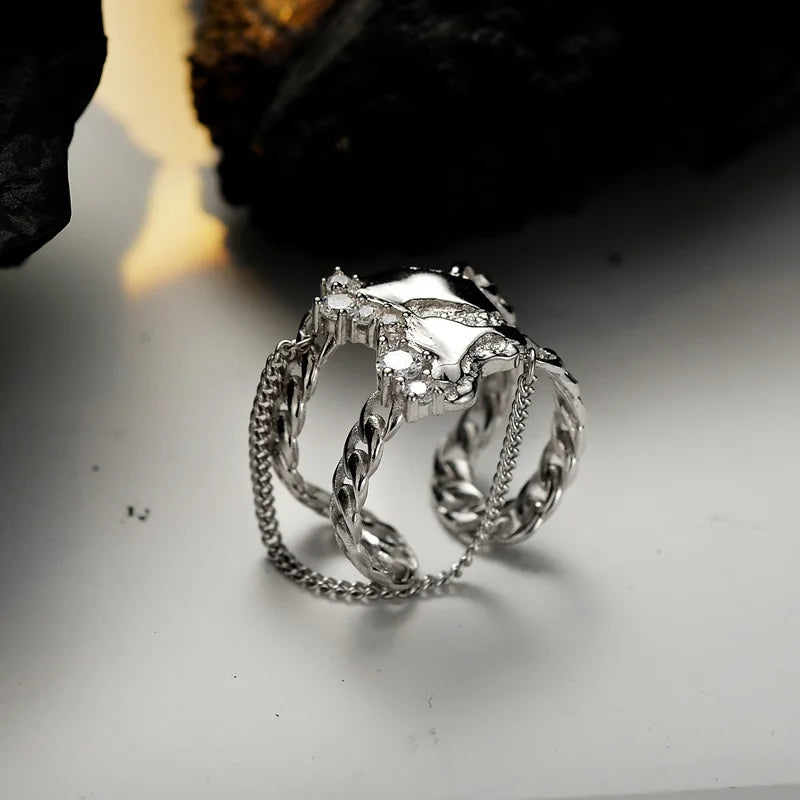 Breiter Ring mit Quastenkette R1202