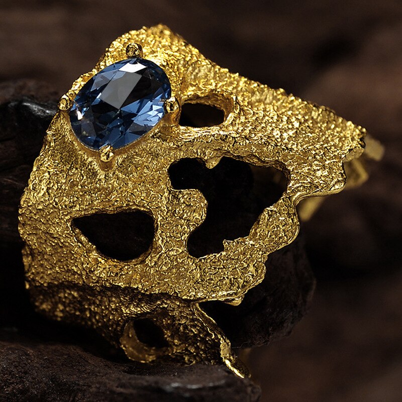Breite Ringe mit blauem Zirkonmuster R1195