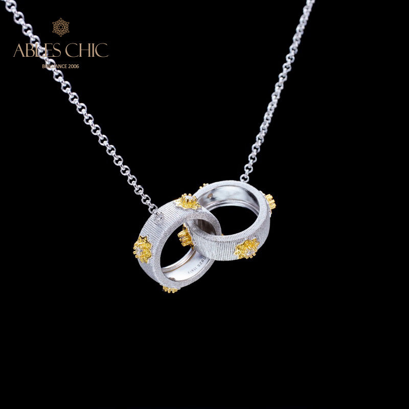 Halskette mit ineinandergreifenden Ringen und Seidenmuster 5861