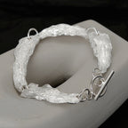 Gliederarmband mit faltigem Blattmuster B1039