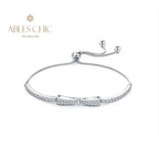 Armband mit gepflasterter Fliege und Bling-Bling-Anhänger B0823