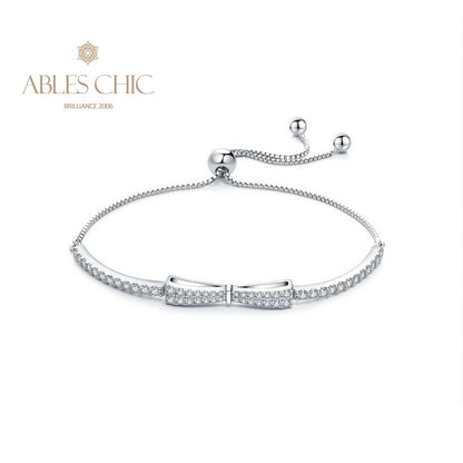Armband mit gepflasterter Fliege und Bling-Bling-Anhänger B0823