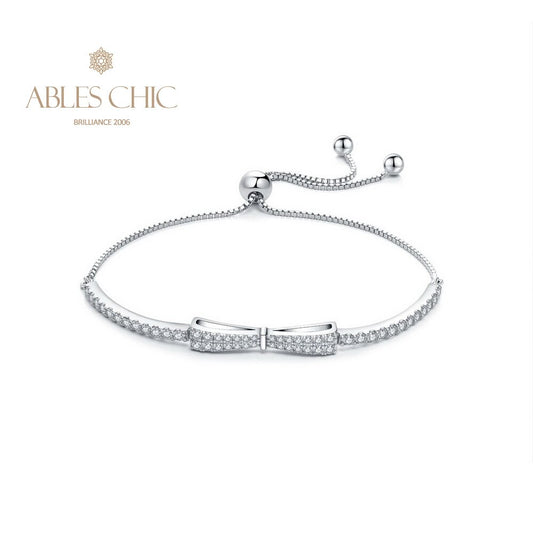 Armband mit gepflasterter Fliege und Bling-Bling-Anhänger B0823