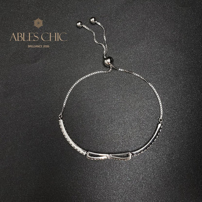 Armband mit gepflasterter Fliege und Bling-Bling-Anhänger B0823
