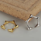 Offener Ring mit geometrischem Stern R1138