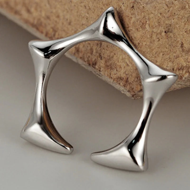 Offener Ring mit geometrischem Stern R1138