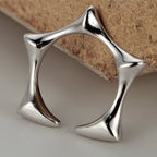 Offener Ring mit geometrischem Stern R1138