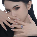 Alien-Ring mit lila Zirkonen R1236