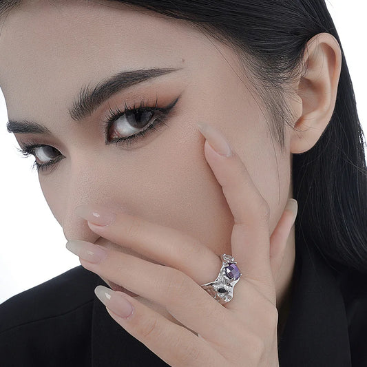 Alien-Ring mit lila Zirkonen R1236