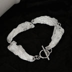 Gliederarmband mit faltigem Blattmuster B1039