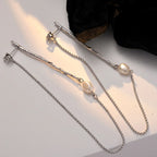 Borque Perlen-Ohrring mit langer Kette E1179