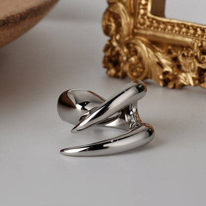 Offener Ring mit Krallenelement R1046