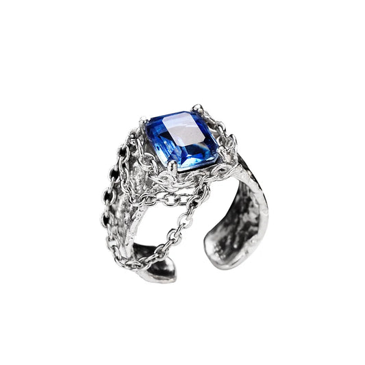 Klobiger Ring mit Quastenkette R1211