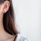 Ohrringe in O-Form mit Verdrehung E1000