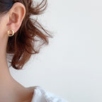 Ohrringe in O-Form mit Verdrehung E1000