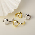 Ohrringe in O-Form mit Verdrehung E1000