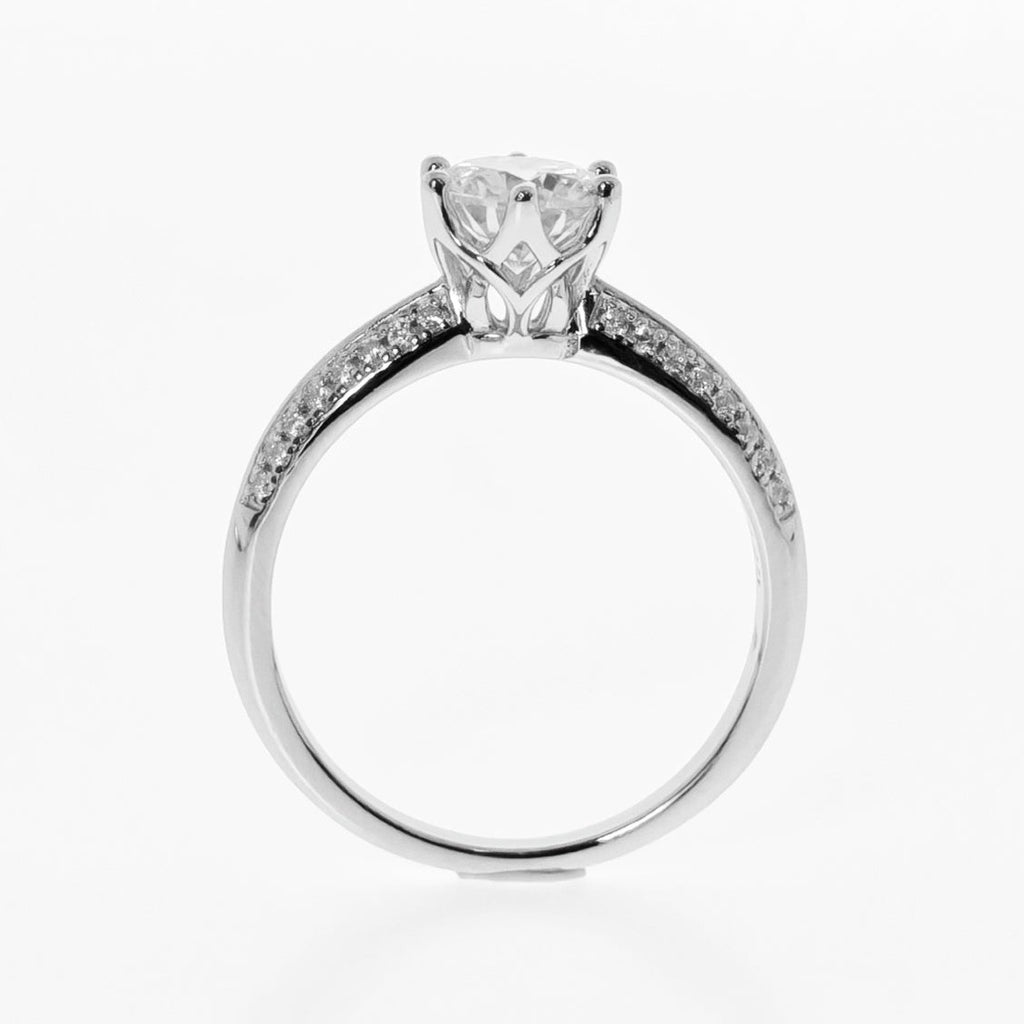 Moissanite ring on a white background